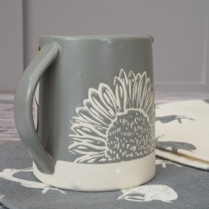 Grey Artisan Flower Creamer Jug Stoneware With Sunflower Detail Grey Artisan Flower Creamer Jug Stoneware With Sunflower Detail